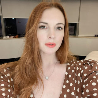 Lindsay Lohan with brown polkadots outfit